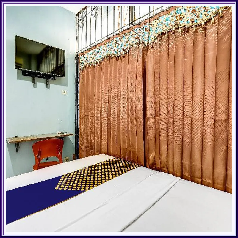 SPOT ON 90147 Gosepa Ambengan Plaza Hotel room image