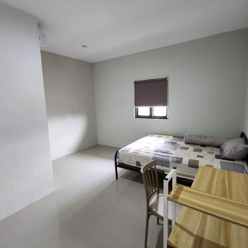 OYO 95107 Green Homestay Near Ubaya Hotel room image