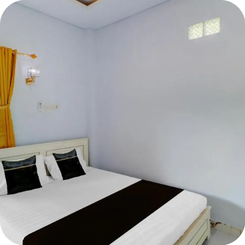 Hotel O near Mangusada Hospital formerly Rare Home Cozy Stay Premier 2 Hotel room image