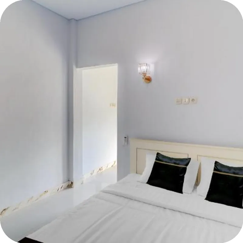 Hotel O near Mangusada Hospital formerly Rare Home Cozy Stay Premier 2 Hotel room image